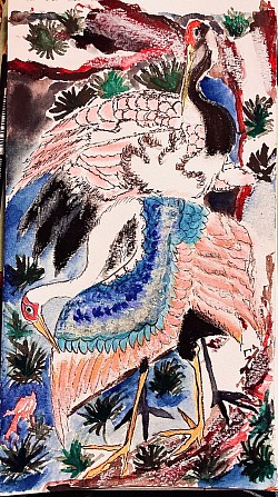 Deux grues sur une branche enneigée